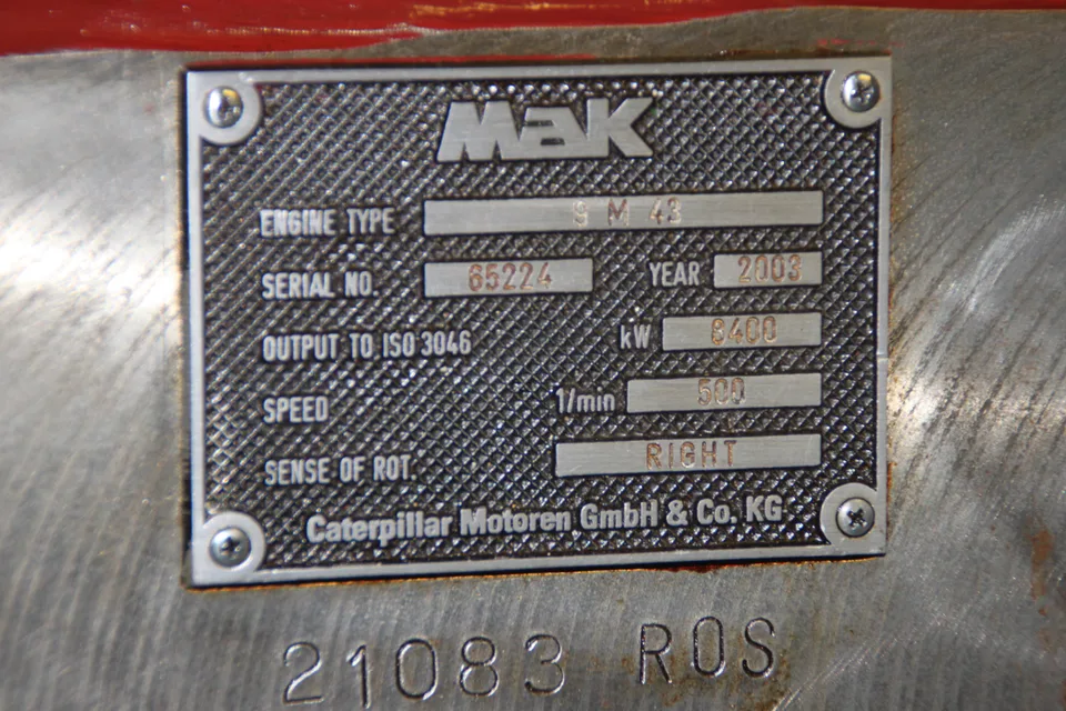 Engine builder's nameplate reading Caterpillar Motoren GmbH and Co. KG on a MaK 9M43 marine diesel